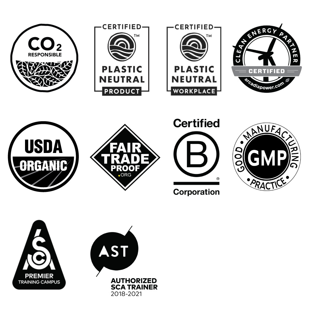 Amavida Coffee Roasters Certifications and emblems for: CO2 Responsible, rePurpose Global Plastic Neutral, Arcadia Clean Energy Certified, USDA Organic, Fair Trade Proof, Certified B Corp, GMP, SCA Premier Training Campus, AST Authorized Trainer